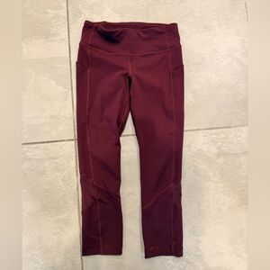 lululemon Pace Rival Crop leggings in a maroon or burgundy colo